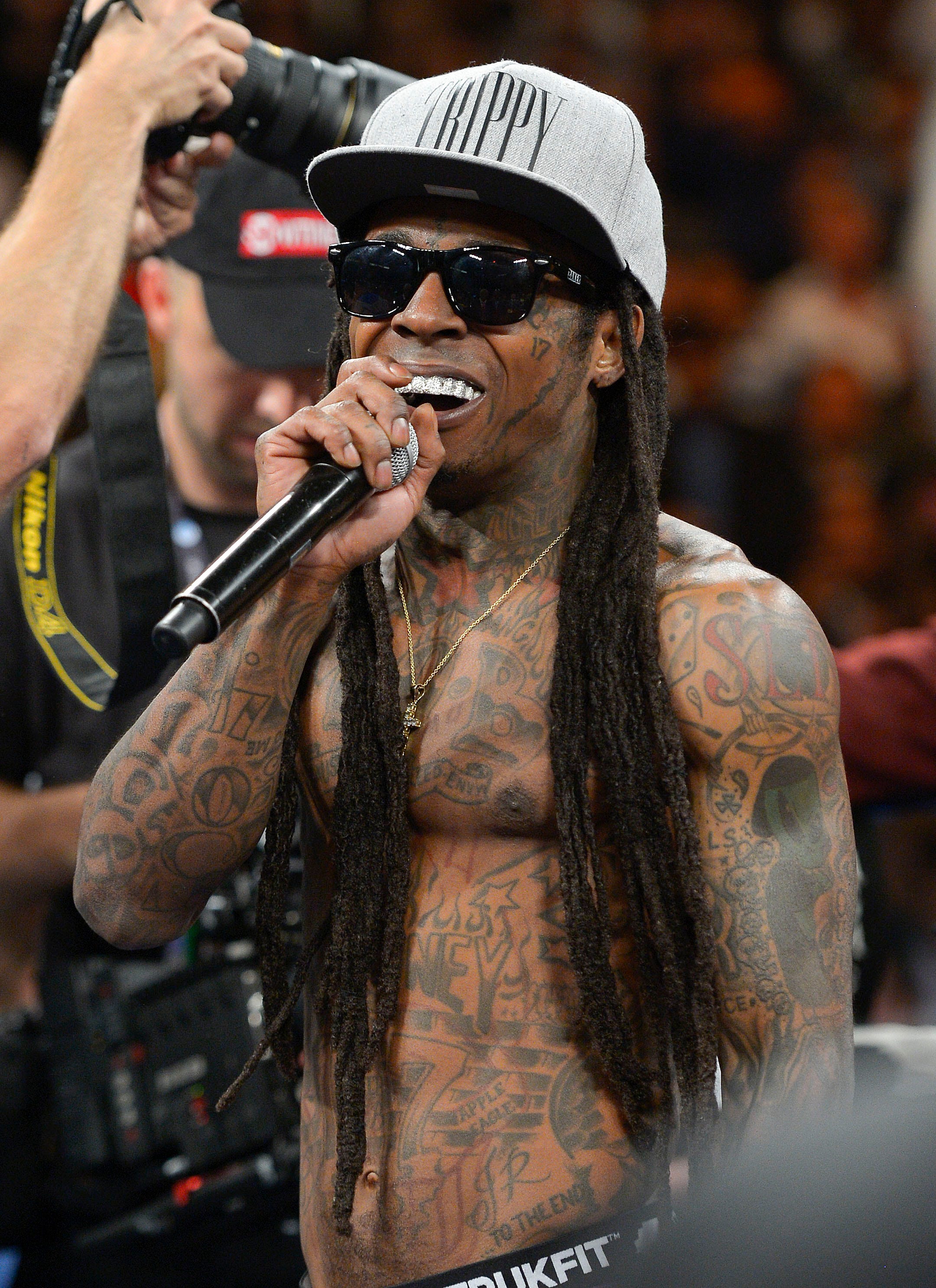 Lil Wayne  Among  Image 5 from Tattd Up Spotlight Religious Tattoos   BET